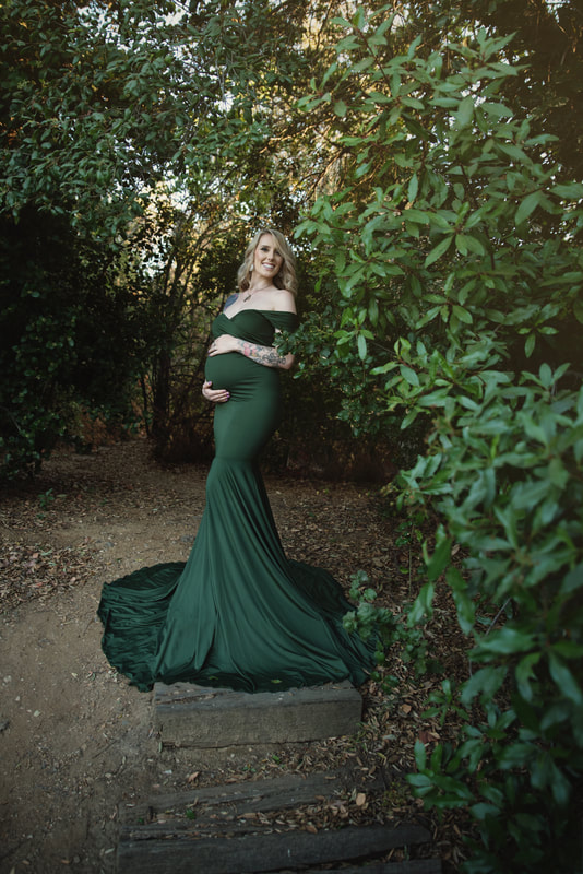 Pregnant Mama Holding Belly Outside in Chicaboo Gown