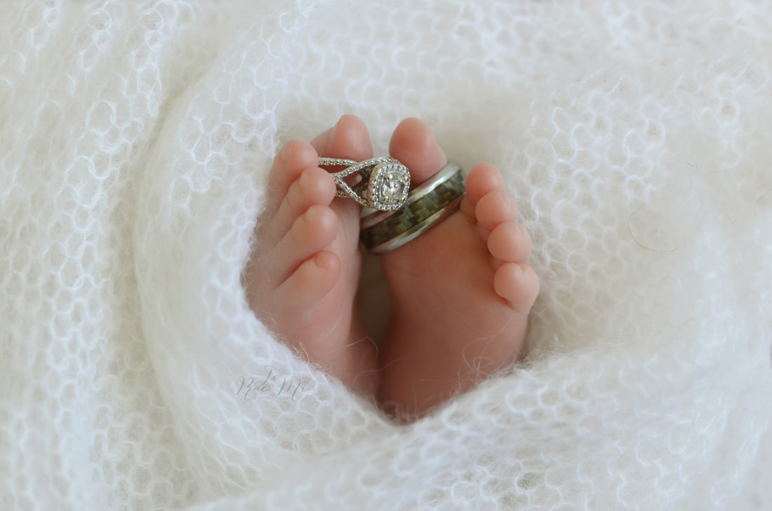 11 day old baby boy feet with wedding rings {glendora newborn photographer}