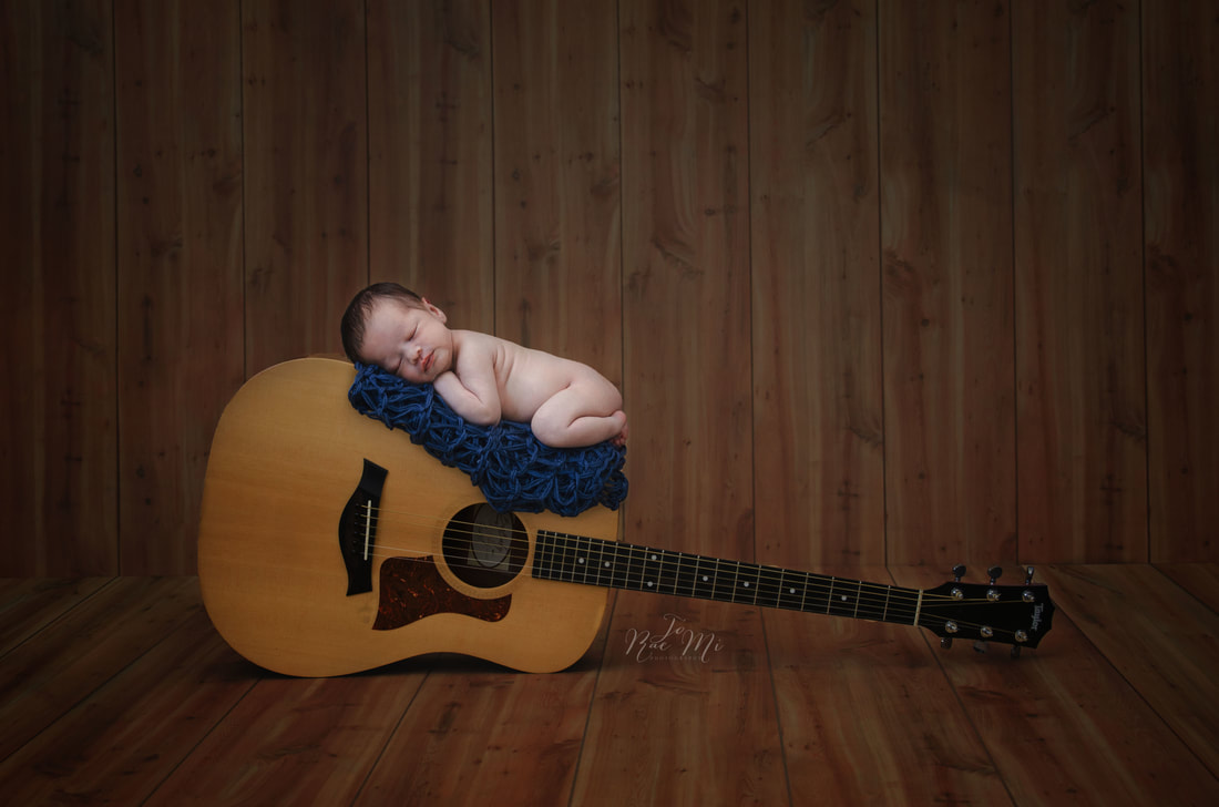 11 day old baby boy on daddys guitar {glendora newborn photographer}