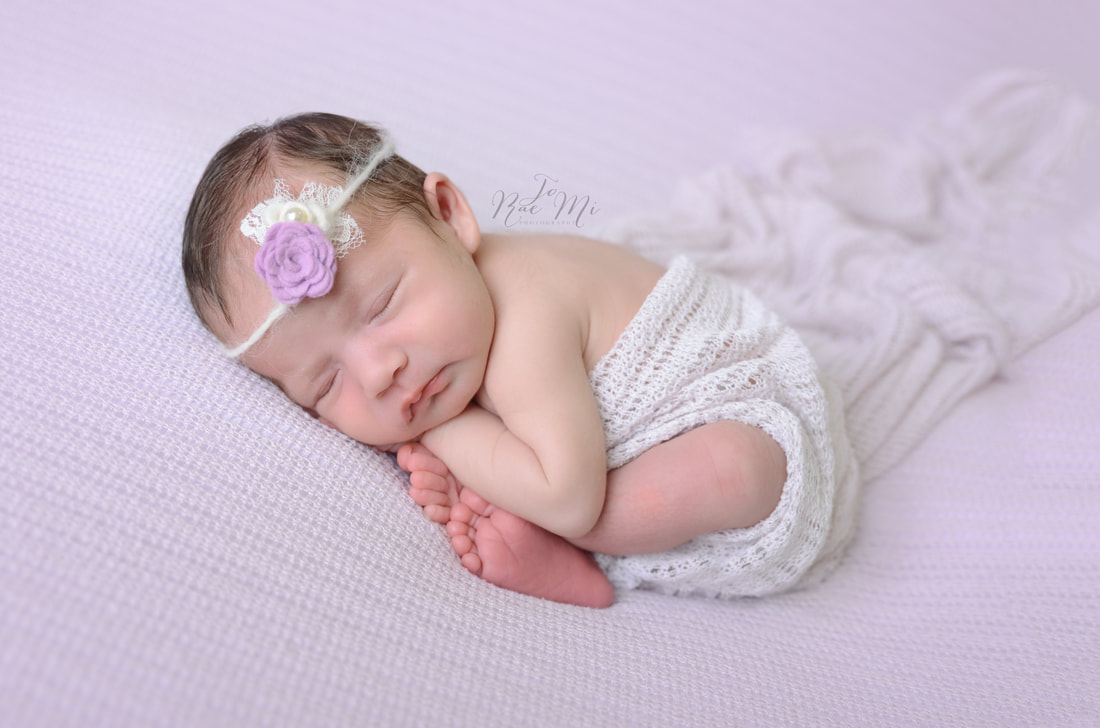 sleepy little girl curled up on blanket  ~ 15 day old baby {norco newborn photographer}
