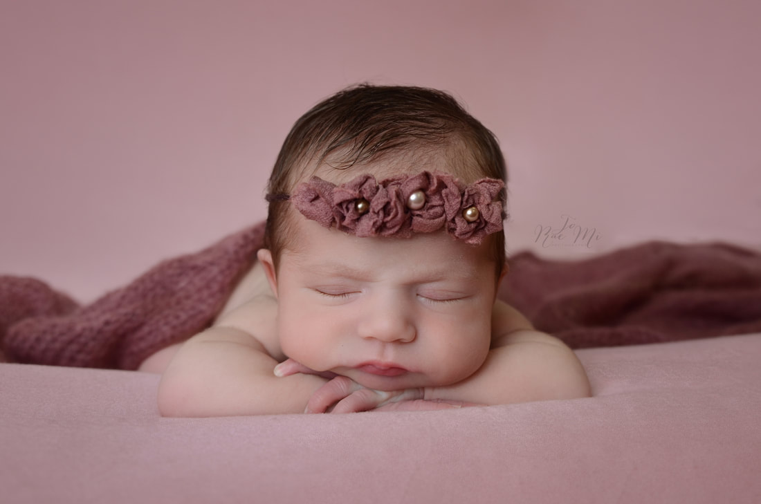 sleepy little girl in gorgeous flower tieback ~ 15 day old baby {norco newborn photographer}