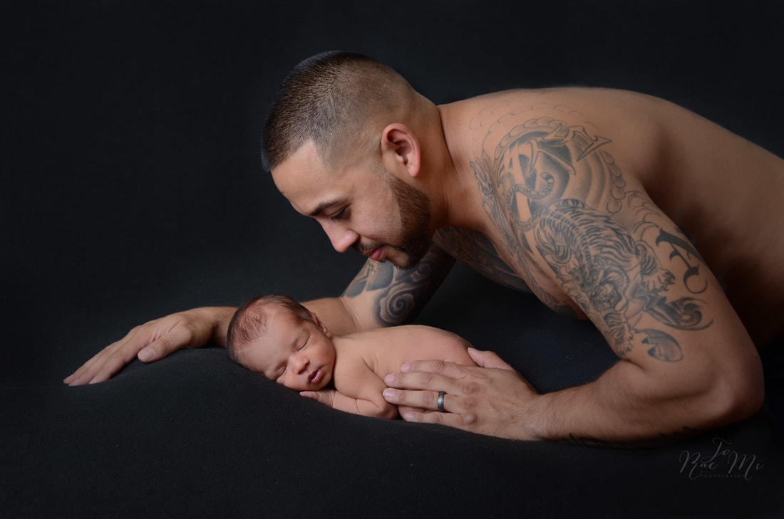 14 day old baby boy with tattooed daddy {ontario newborn photographer}